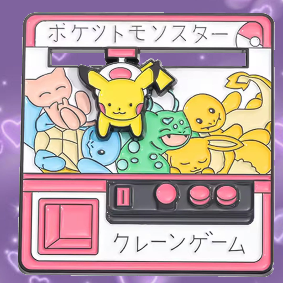 Moveable claw machine enamel pin